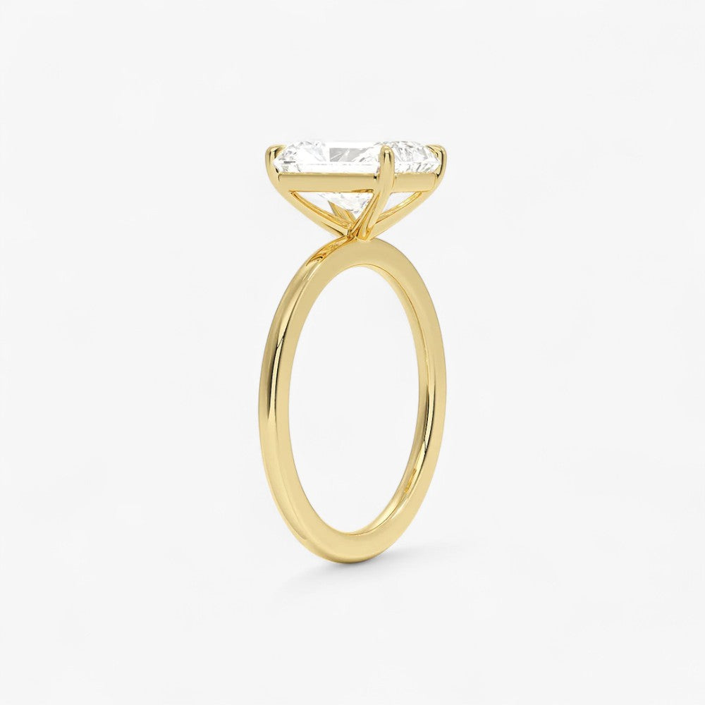 Verlobungsring mit 2 Karat Radiant Cut Diamant in Gelbgold – moderner Solitär mit rechteckigem Brillantschliff für einen glamourösen Heiratsantrag.