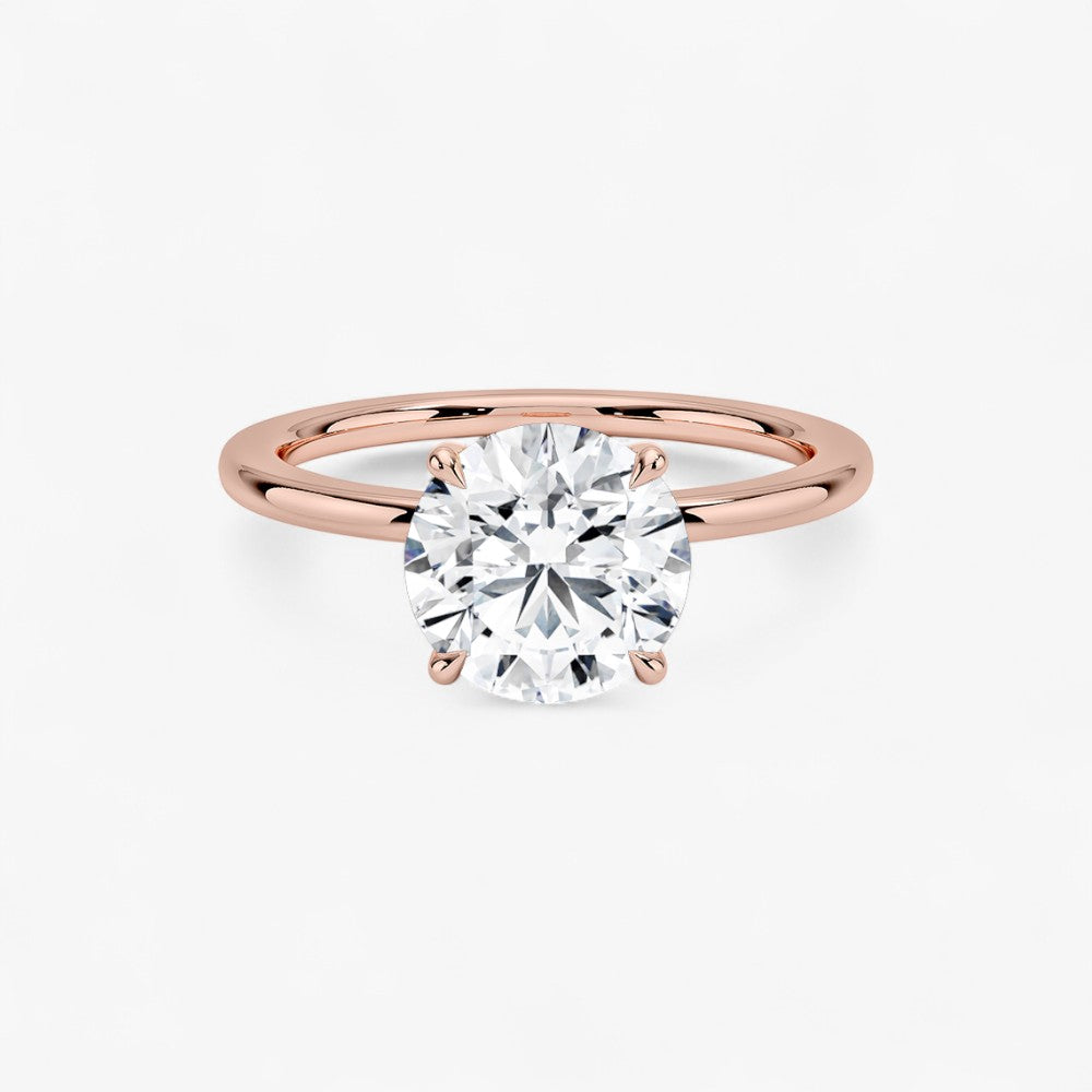 Luxuriöser Solitär Verlobungsring mit rundem 2 Karat Diamant in Roségold – Draufsicht auf das brillante Schliffmuster, hochwertiger Schmuck für den Antrag.