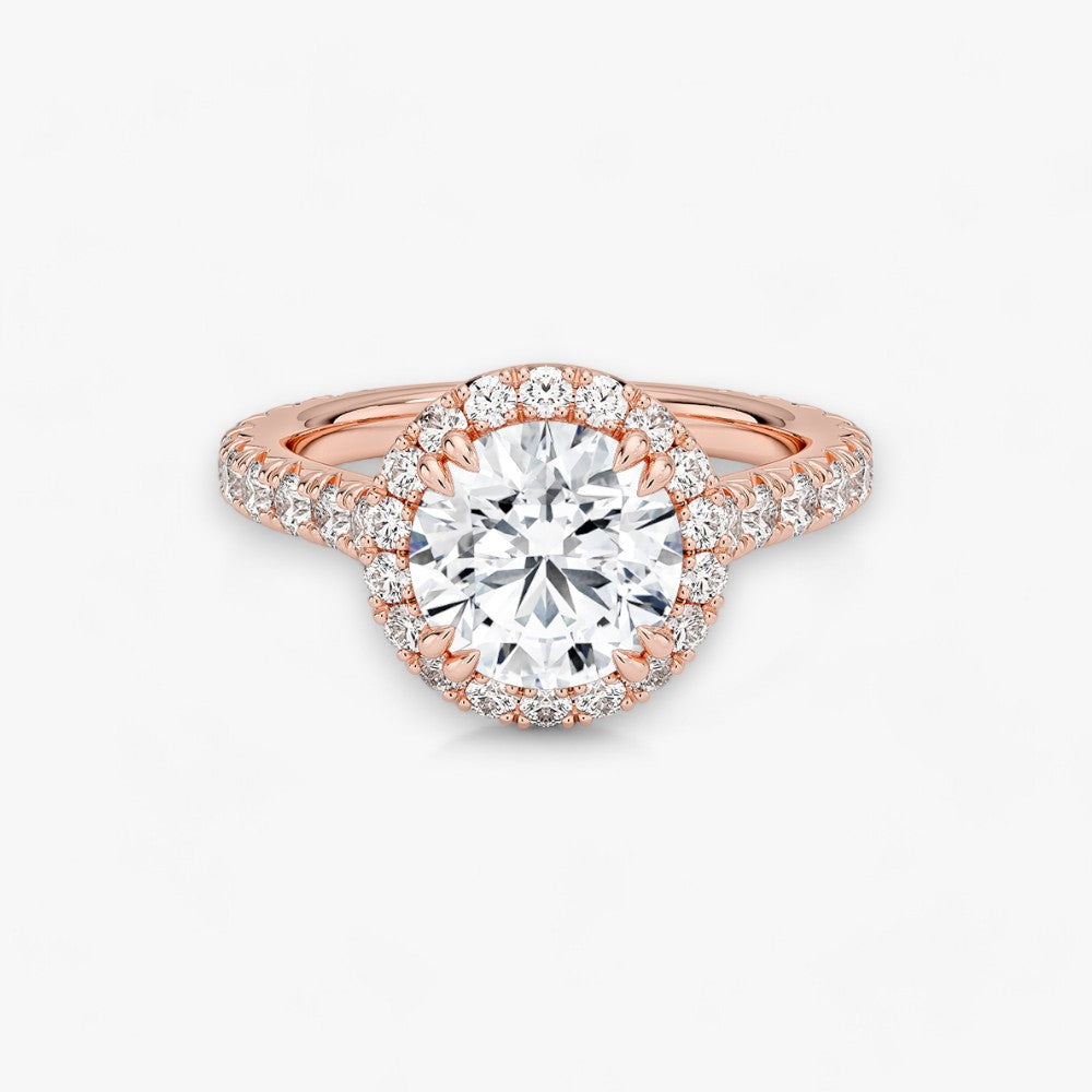 Exklusiver Diamantring aus Rosegold mit einem 2-Karat Rund LabGrown geschliffenen Diamanten, umgeben von einem eleganten Pavé-Halo-Design. Luxuriöser Verlobungsring mit brillantem Steinfunkeln und hochwertiger Handwerkskunst – perfekt für Hochzeitsanträge. Premium-Schmuck für anspruchsvolle Kunden, geeignet für besondere Anlässe.