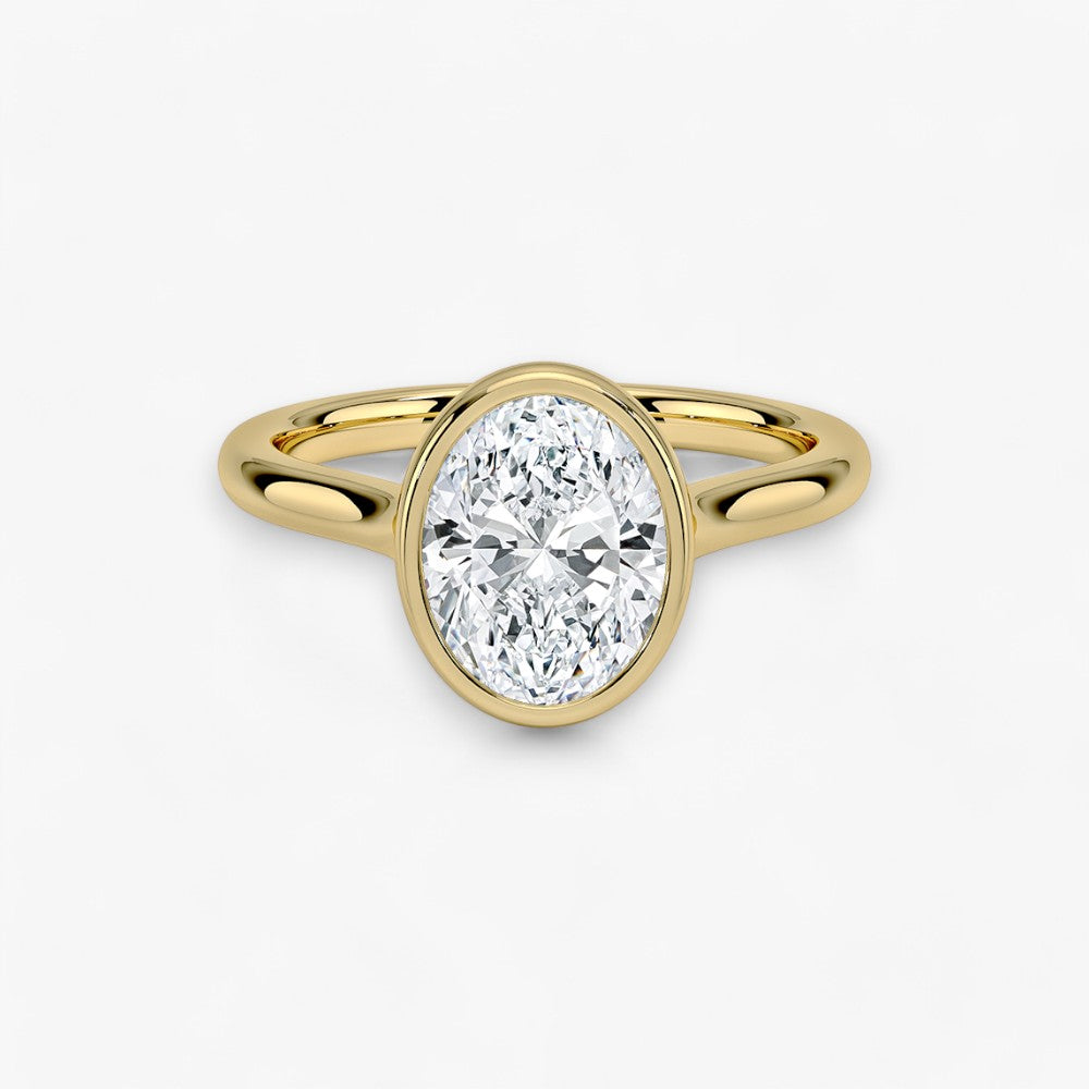 Moderner Verlobungsring mit 2-Karat Oval-Cut-Diamant in einer stilvollen Zargenfassung aus hochwertigem Gelbgold. Minimalistisches Schmuckdesign mit luxuriösem Glanz und zeitloser Eleganz, ideal für Verlobung, Hochzeit oder Jubiläum. Exklusiver Diamantring, der Handwerkskunst und modernes Design vereint. Jetzt den perfekten Verlobungsring für besondere Momente online entdecken und kaufen.