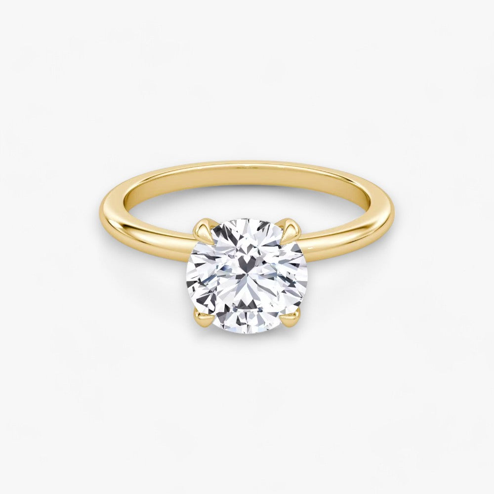 Edler Verlobungsring mit funkelndem Diamant in hochwertiger Weißgold- oder Gelbgold-Fassung. Klassisches Solitärring-Design, perfekte 4-Krappen-Fassung für maximalen Glanz. Ideal für den Hochzeitsantrag oder als Hochzeitsring für Damen. Exklusiver Diamantring mit Zertifikat, zeitlos & elegant – jetzt online Verlobungsring kaufen!