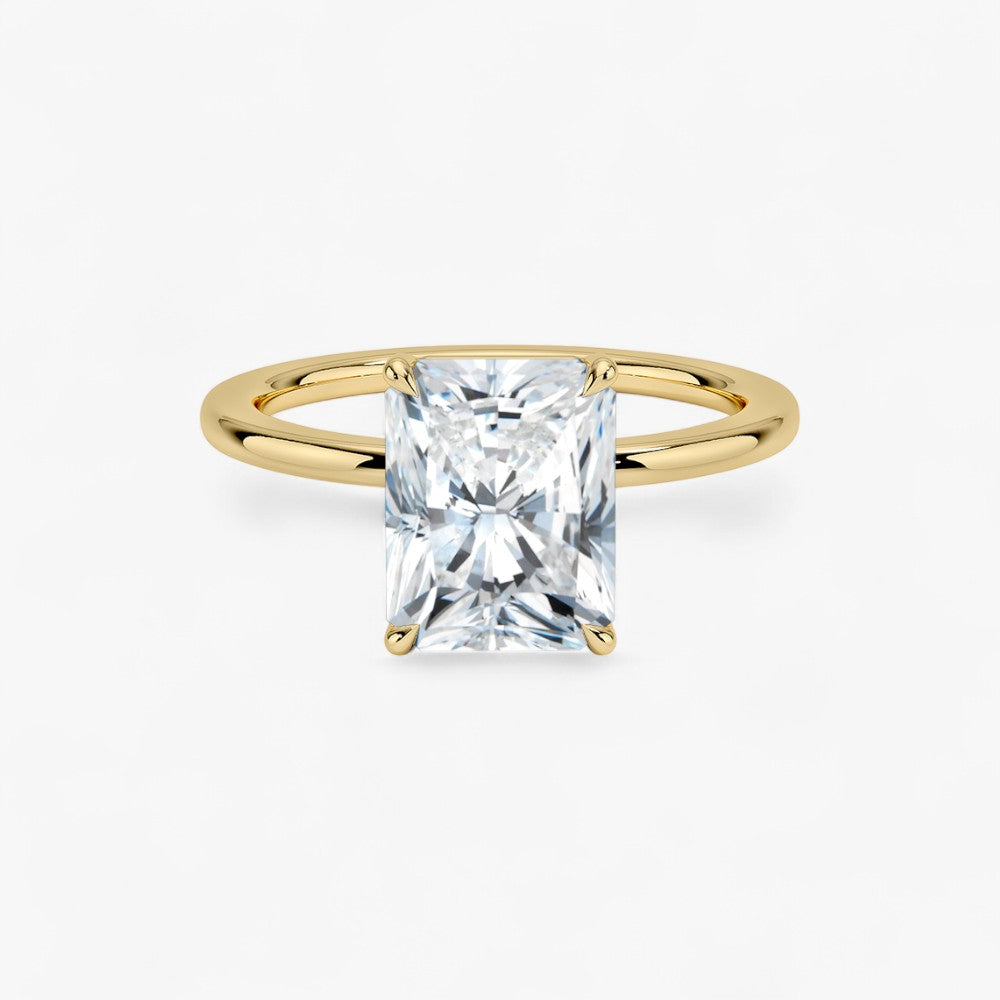 Verlobungsring mit 2 Karat Radiant Cut Diamant in Gelbgold – moderner Solitär mit rechteckigem Brillantschliff für einen glamourösen Heiratsantrag.