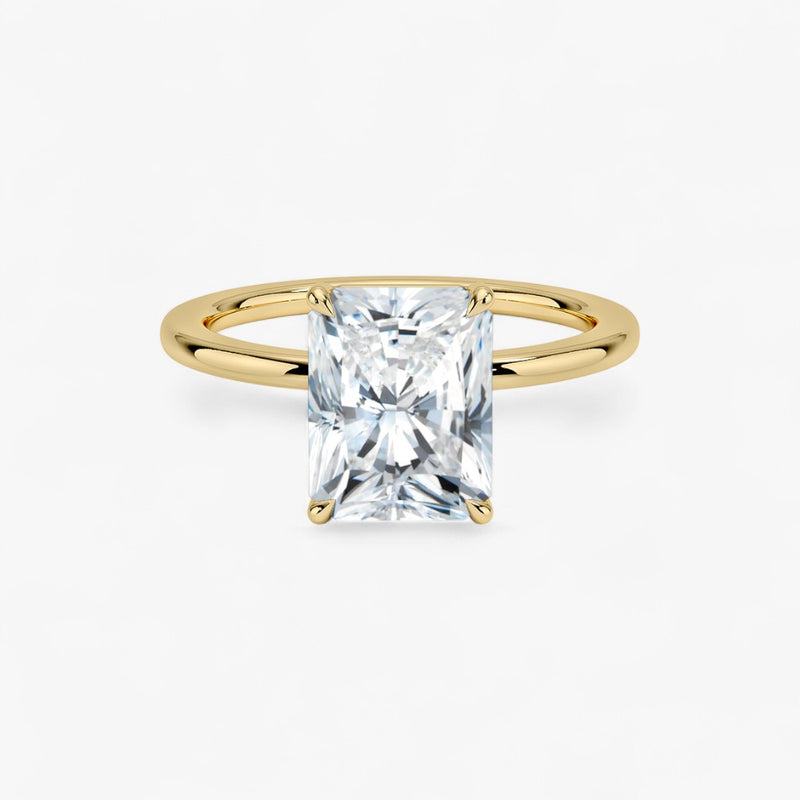 Verlobungsring mit 2 Karat Radiant Cut Diamant in Gelbgold – moderner Solitär mit rechteckigem Brillantschliff für einen glamourösen Heiratsantrag.