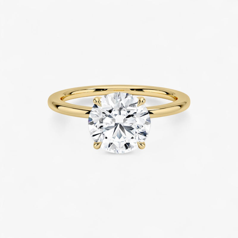 Luxuriöser Solitär Verlobungsring mit rundem 2 Karat Diamant in Gelbgold – Draufsicht auf das brillante Schliffmuster, hochwertiger Schmuck für den Antrag.