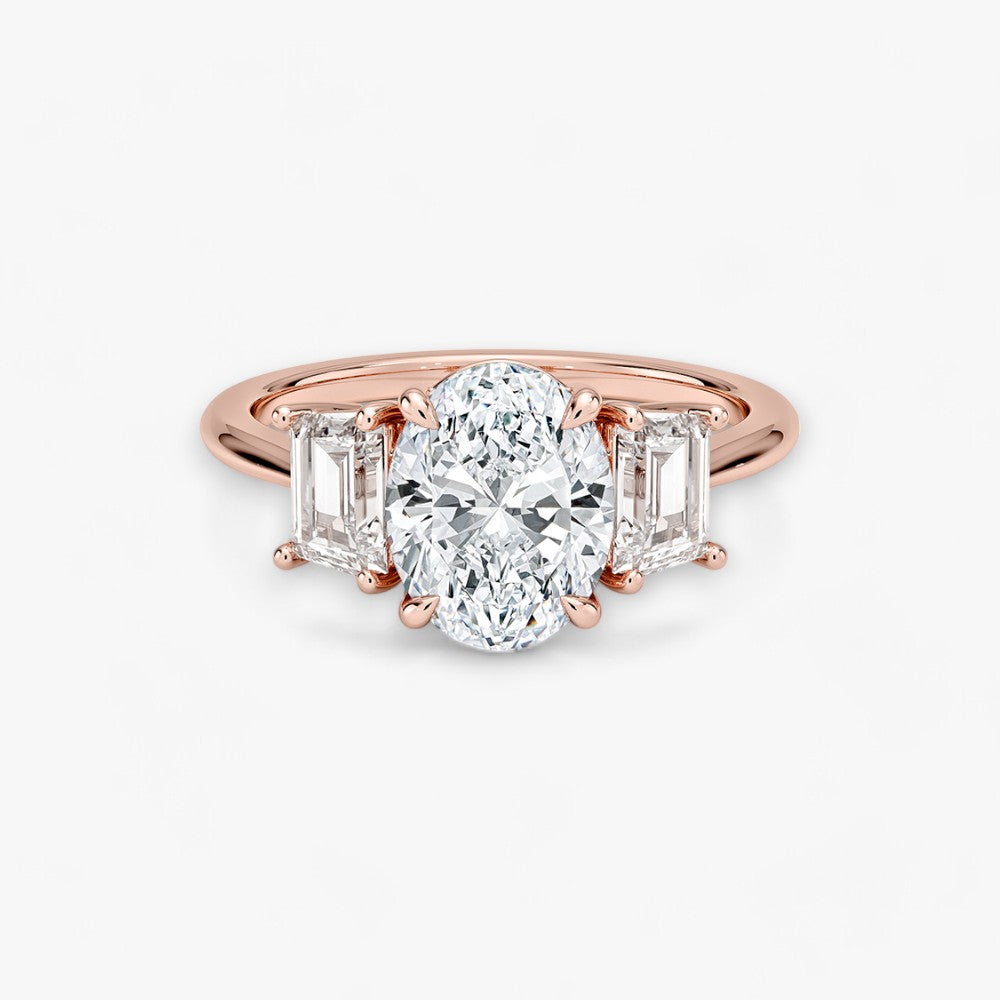 Luxuriöser Verlobungsring mit 2-Karat Oval-Cut-Diamant und seitlichen Emerald-Cut-Diamanten, eingefasst in einer eleganten Rosegold-Fassung. Exklusiver Diamantring mit brillantem Glanz und moderner Ästhetik, ideal für Verlobung, Hochzeit oder Jubiläum. Hochwertiges Schmuckdesign mit zeitloser Eleganz und handgefertigter Präzision. Perfekter Verlobungsring für besondere Momente. Jetzt online entdecken und bestellen.