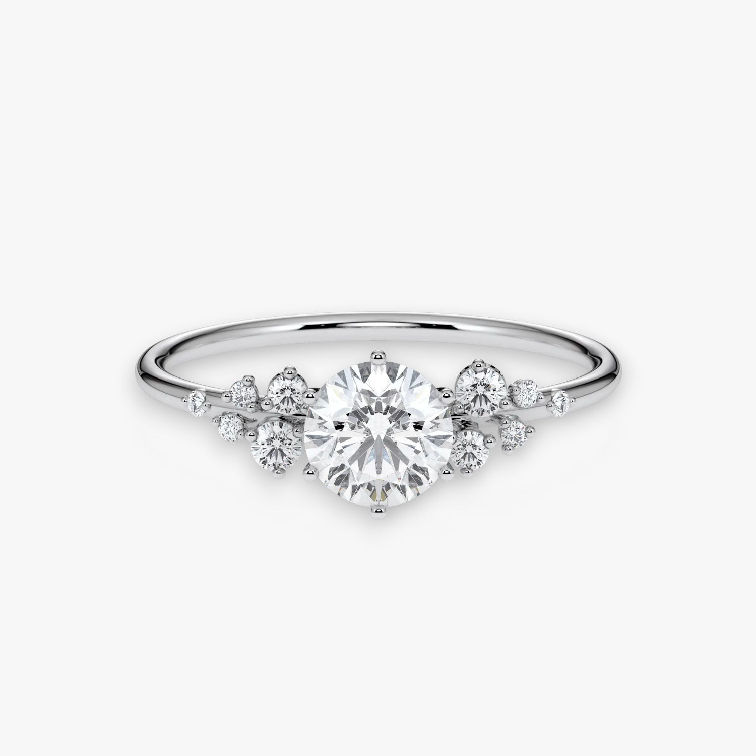 STARLIGHT Verlobungsring in Weissgold bzw. Platin mit rundem Diamant-Solitär und Diamant-Cluster – Frontalansicht von NÓIR Diamonds