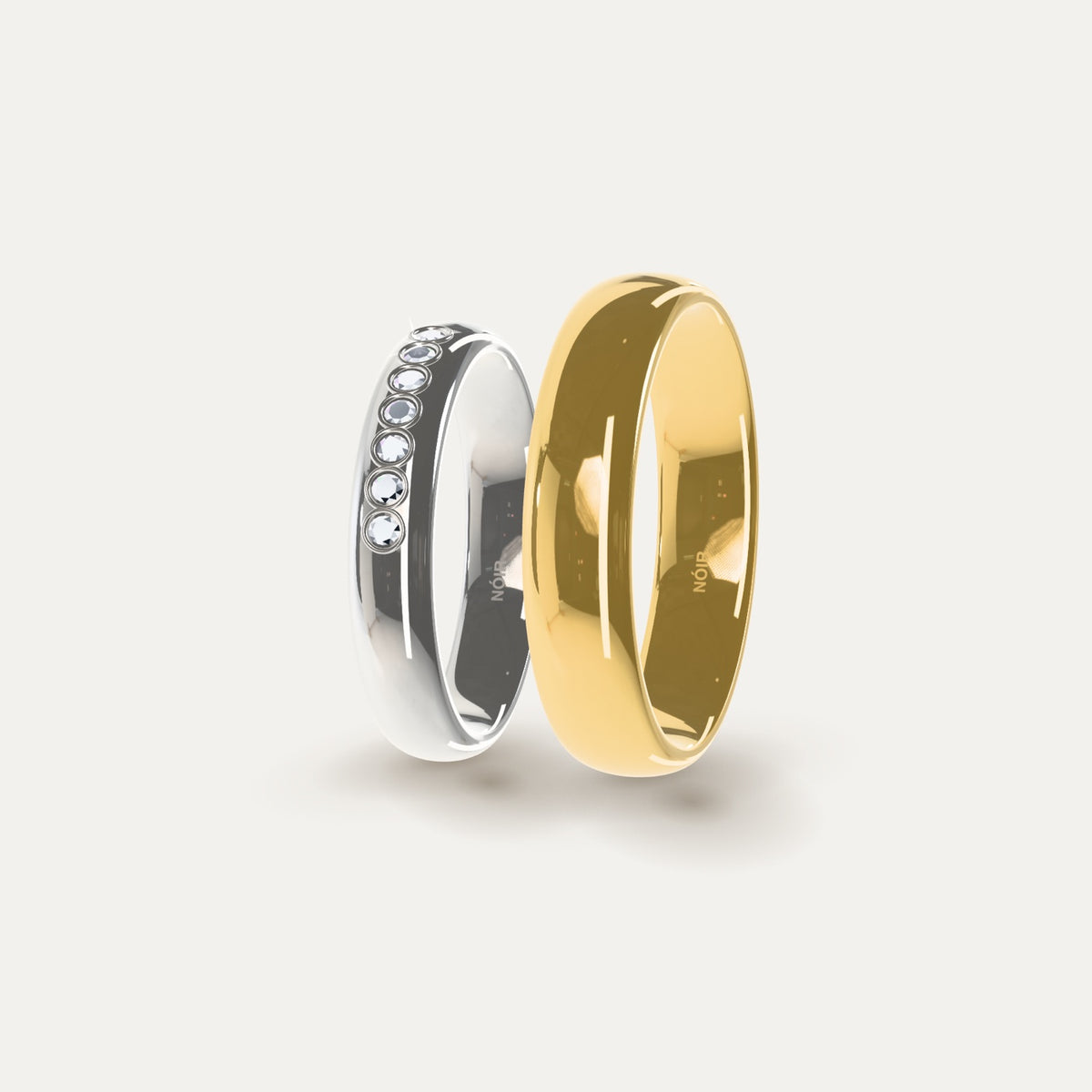 Trauringe selbst gestalten: Weißgold-Ring mit Diamanten und Gelbgold-Ring aus dem NÓIR 3D-Konfigurator